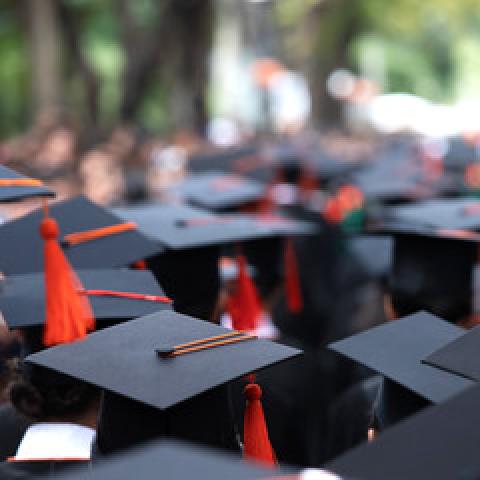 graduates in cap and gown